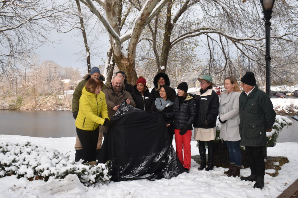 Peace Bridge donors unveiling the donor appreciation rock for the bridge.