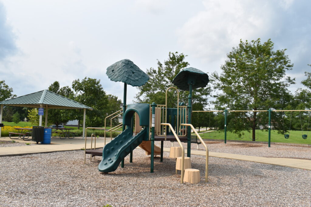 Bennett Park playset displaying swing and climbing structure.