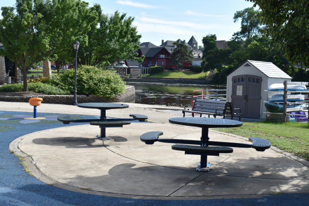 Batavia Riverwalk showing two picnic tables.