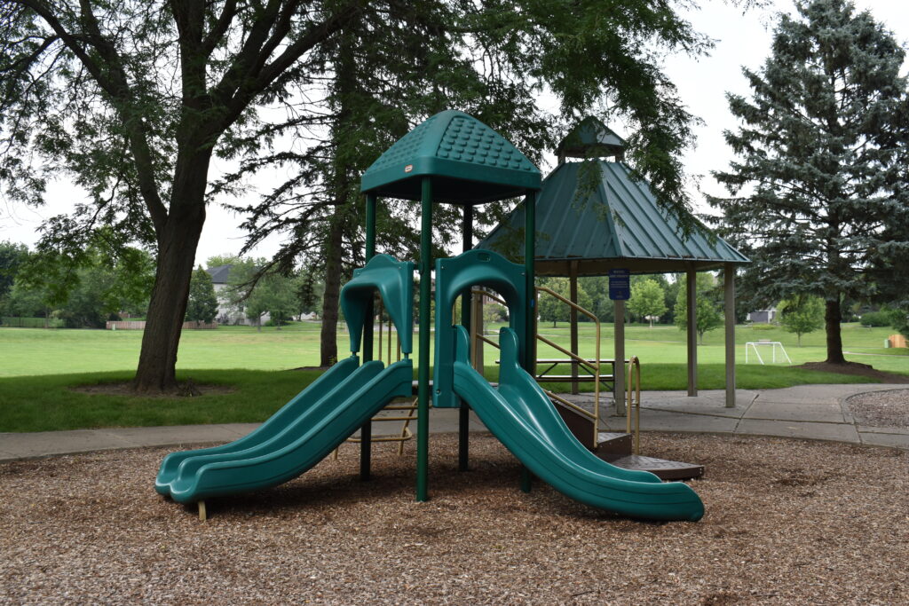 H. Michael Wild Park playground showing two smaller slides.