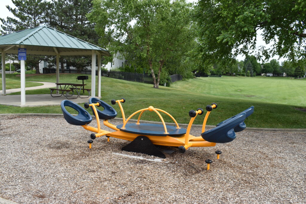Hartfield Park playground with bouncy play equipment.