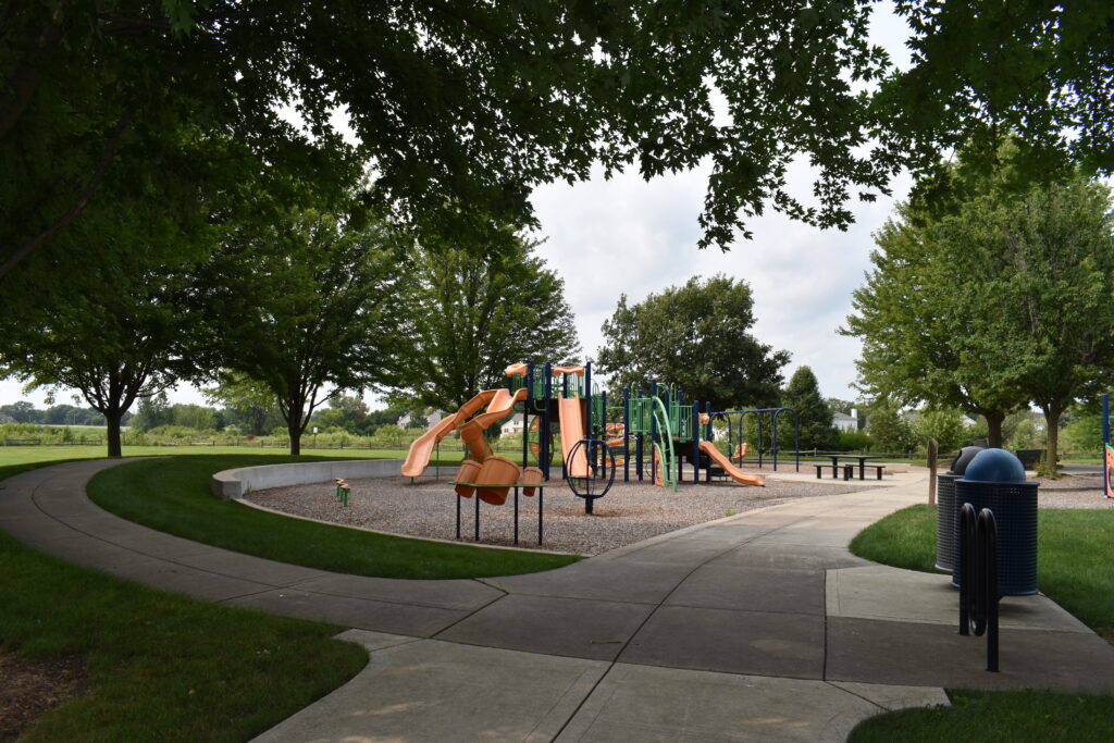 Jones Meadow overview of playground showing pathway into park.