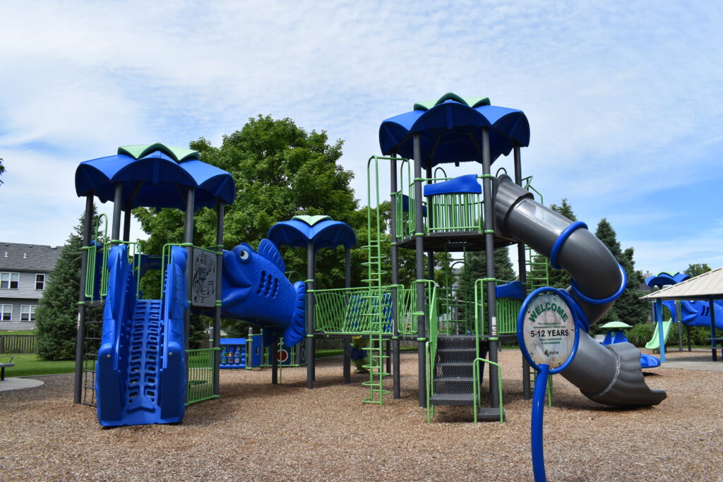 Levi Newton playground showing a slide and climbing structures.