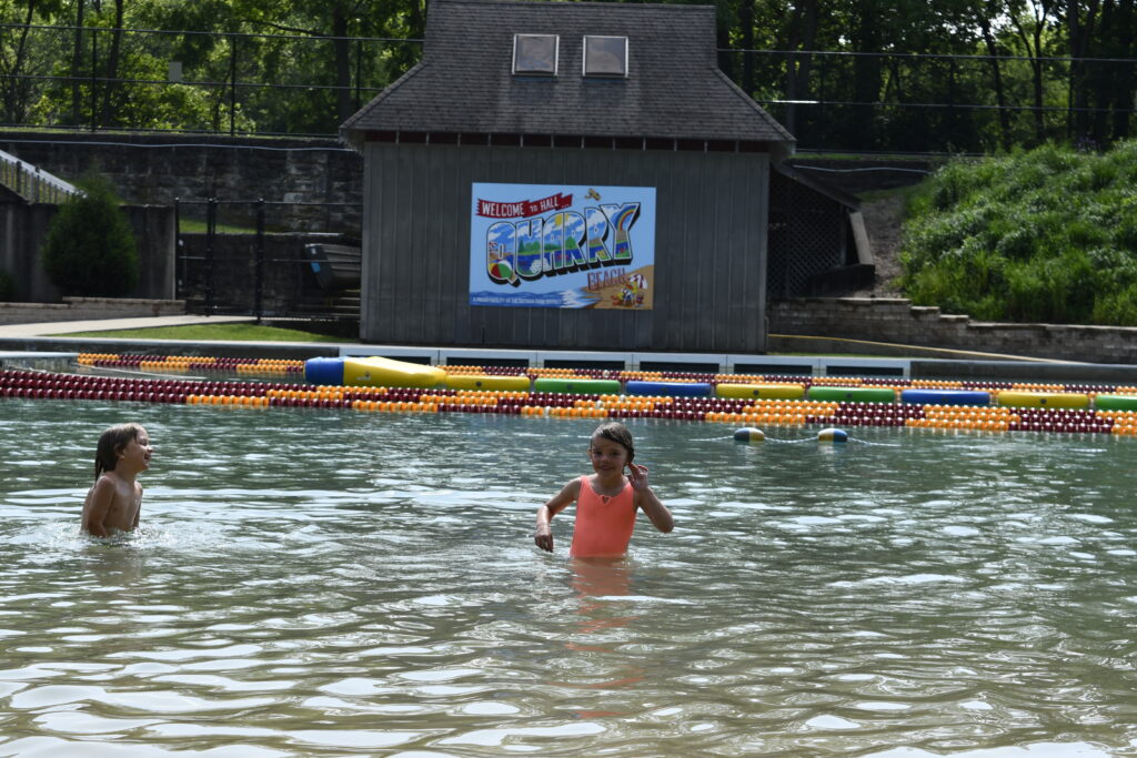 Girls in outdoor Quarry swim facility during swim lessons