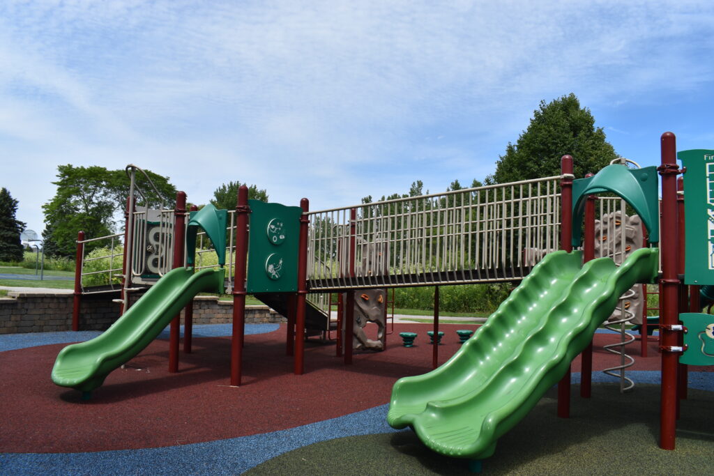 South Mill Creek Park playground geared towards younger children, showing two slides.