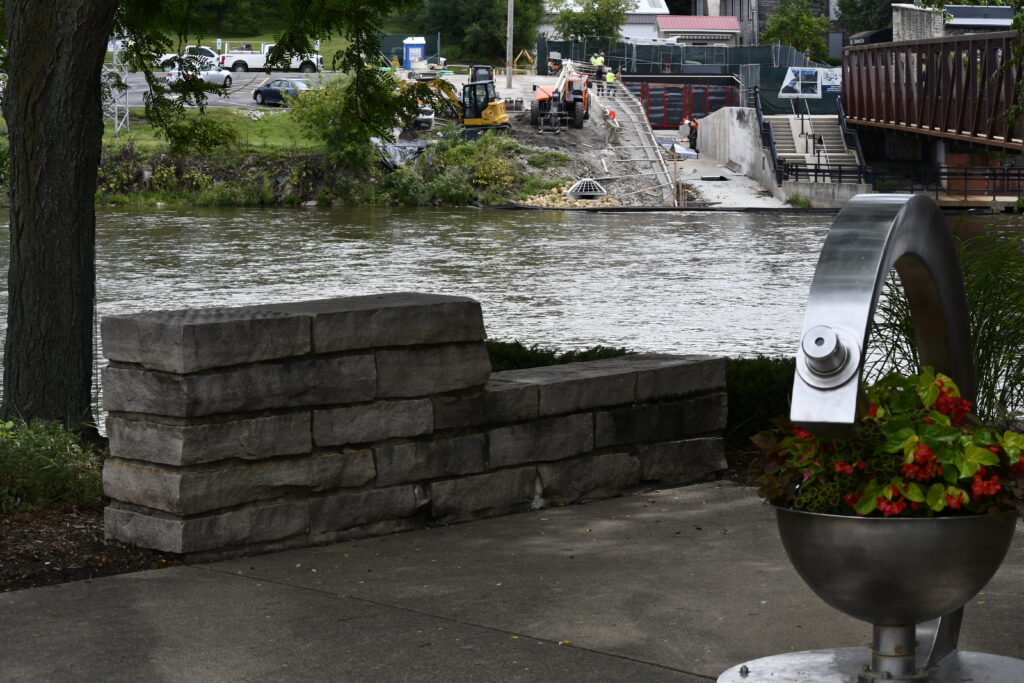 South Riverwalk Plaza shows a scenic view of the river.
