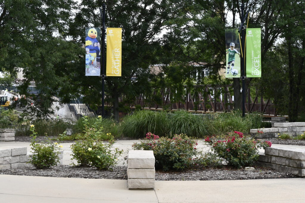 South Riverwalk Plaza entrance showing flowers.