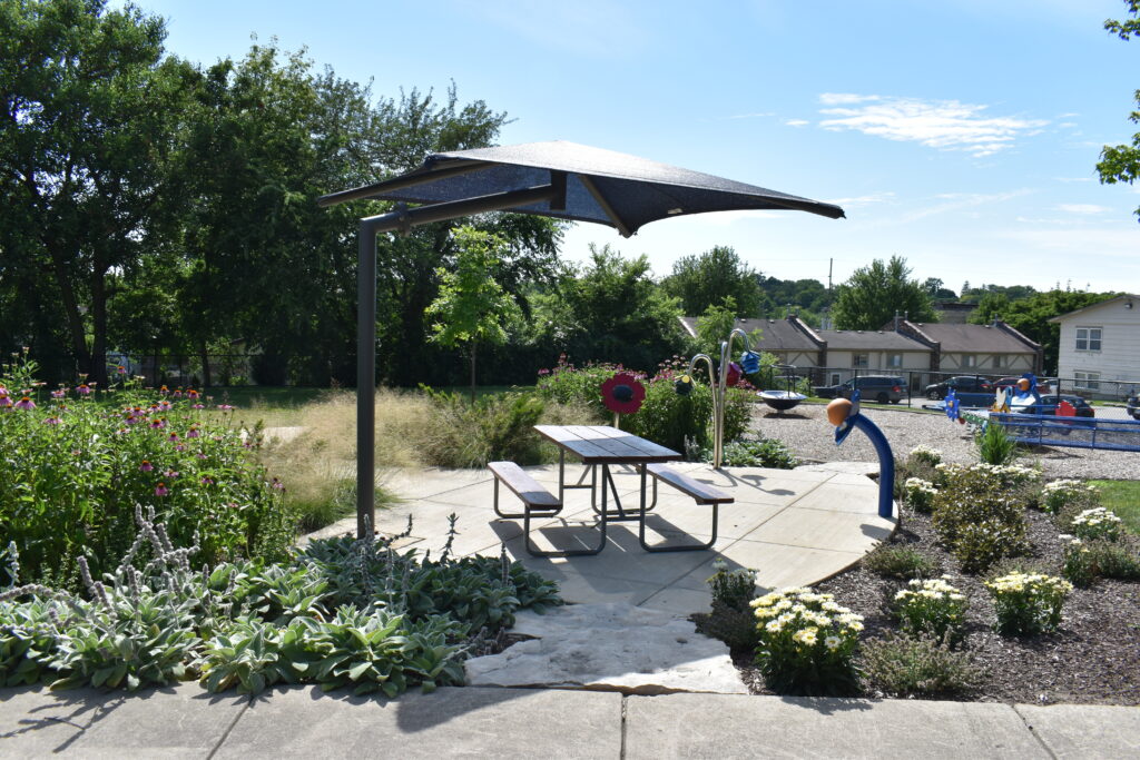 Washington Park shaded picnic area with a picnic table.