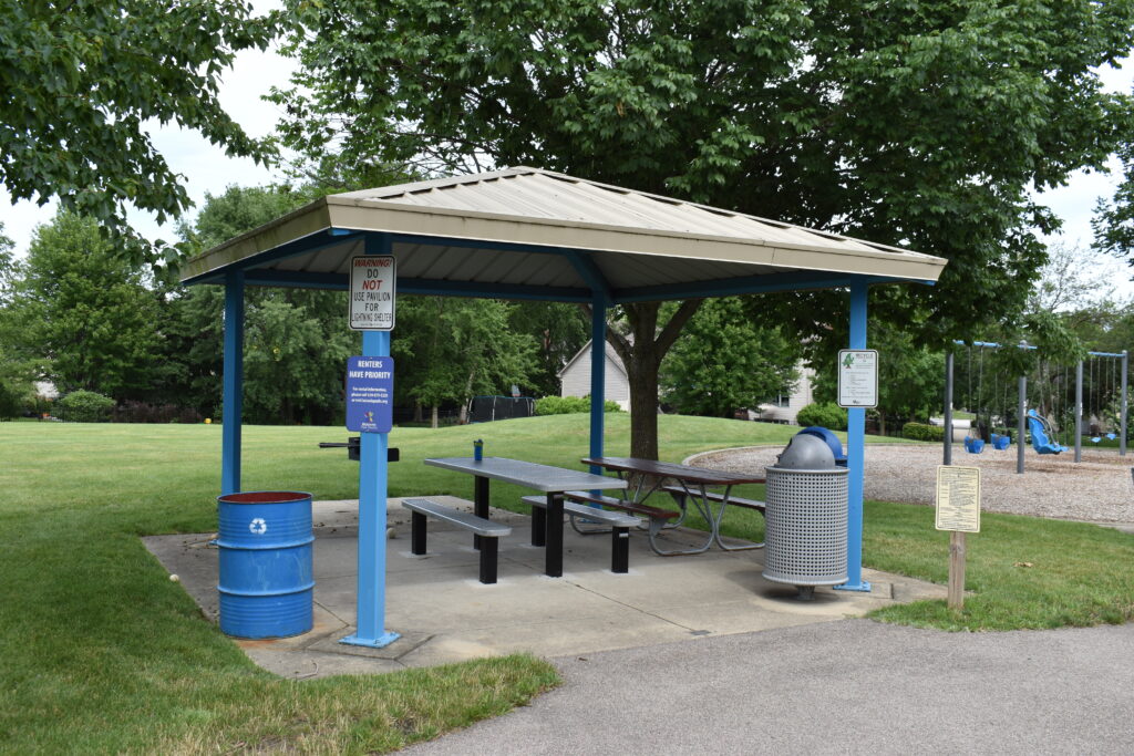 Wind Energy Park pavilion showing picnic table and trash can.