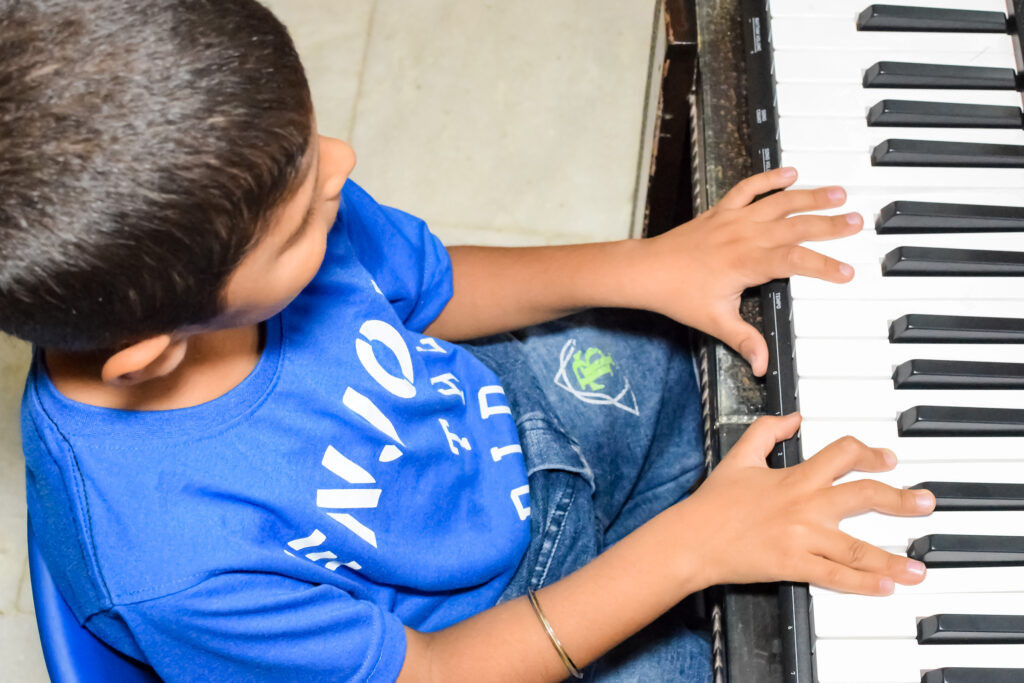 Boy playing the piano