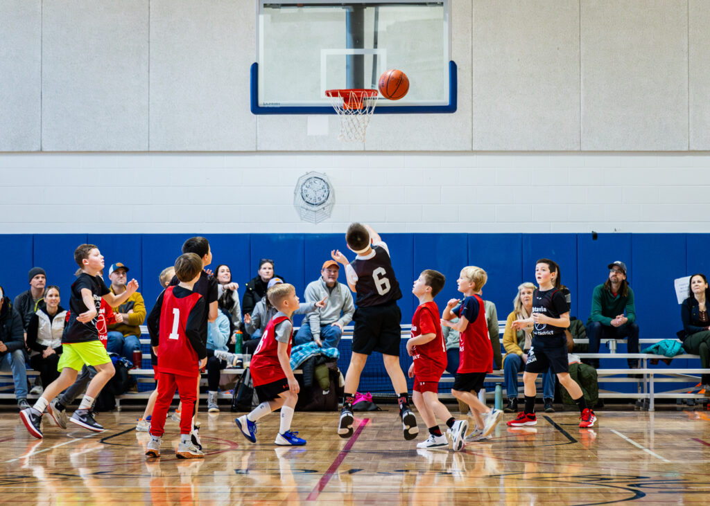 Boys playing basketball in a youth league