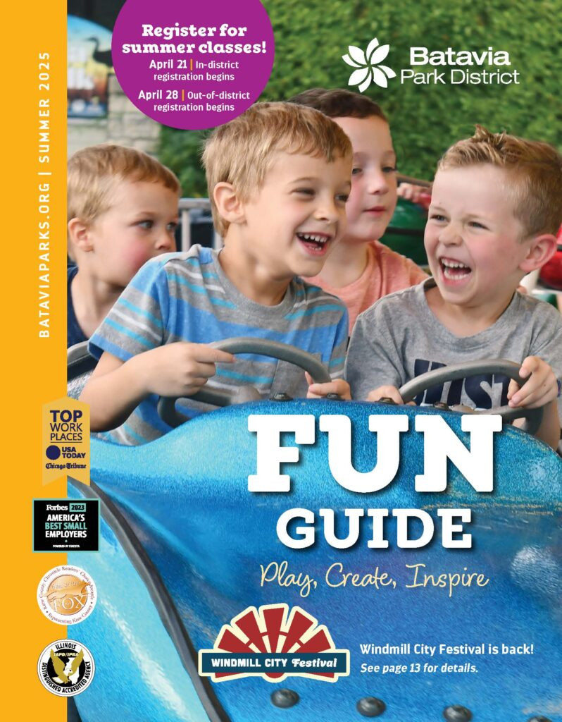 Summer Fun Guide cover showing two boys laughing while riding a car carnival ride