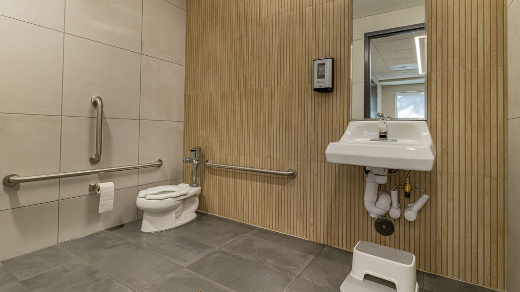 ADA accessible restroom with toilet and sink